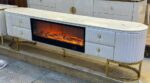 White and gold electric fireplace TV console with LED flame display and heater design 3