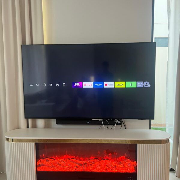 White and gold electric fireplace TV console with LED flame display and heater design 4